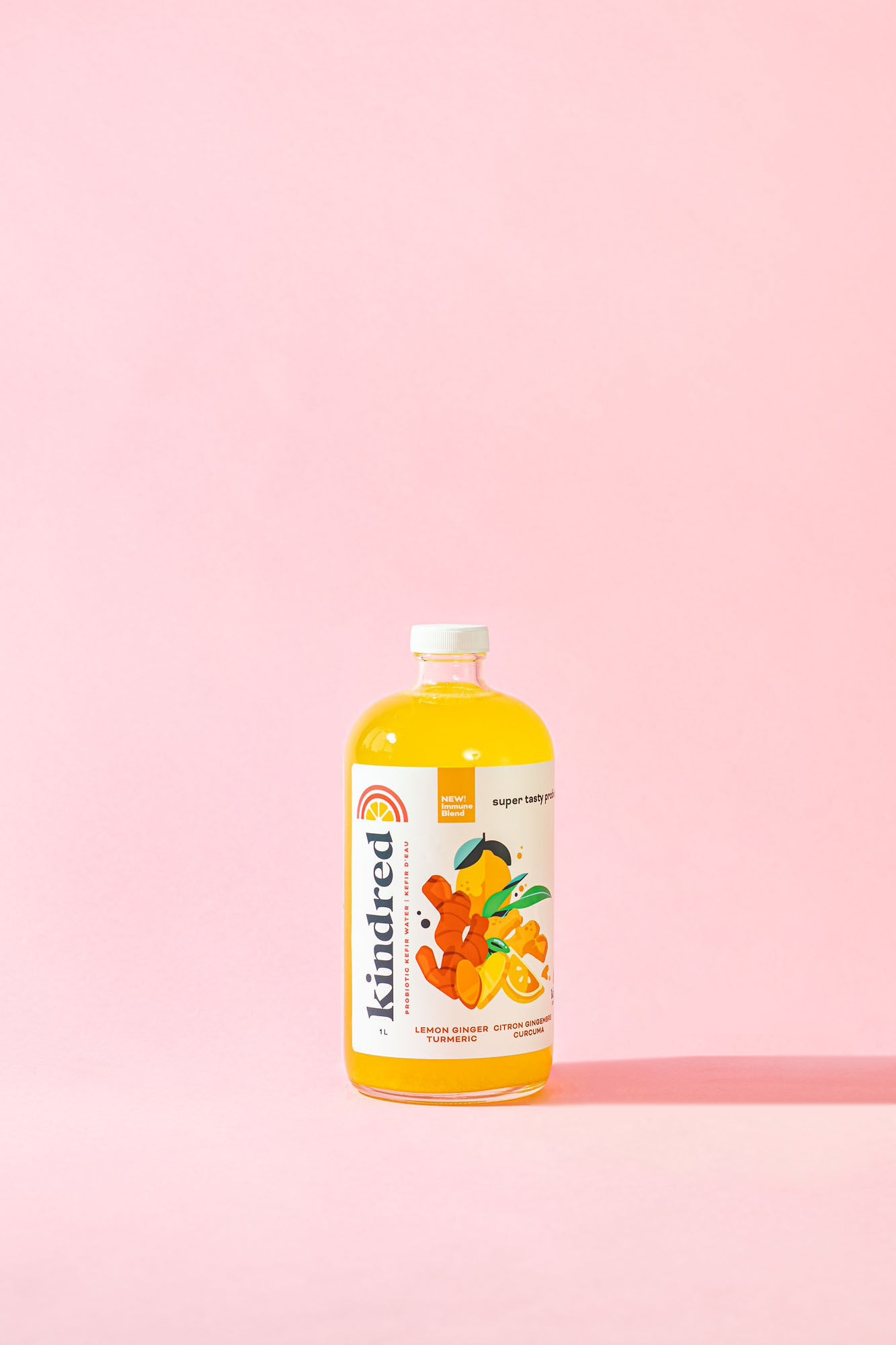 Kindred Cultures Lemon Ginger Turmeric Kefir Water in a 1L Glass Bottle